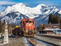 Mount Girouard looms in the background as a lone, road-worn SD40-2 works the yard at Banff, Alberta.