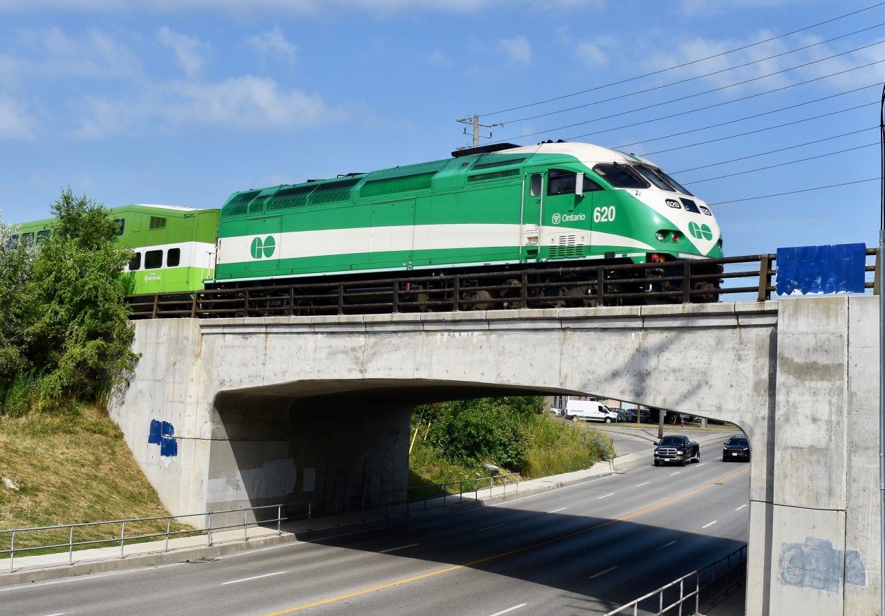With MP40-PH 620 shoving at full throttle, the 10:36am GO train which as just departed the downtown station is seen flying over McLaughlin rd very quickly as it’s speed slowly creeps back up to about 50mph as the mid-day 6 car train heads to its final destination stop at Mount Pleasent GO, only before the crew rotates their positions onboard and prepare to depart back eastbound with 620 on point in order to bring some more commuters eastbound to Toronto. Train will be back in Downtown Brampton at 11:06 and at Union for 11:51