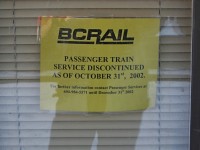 A sign of the times and beginning of the end for BC Rail. This image taken 2 plus years after the Budd car last run, no staff left at the station to remove the notice from the window.