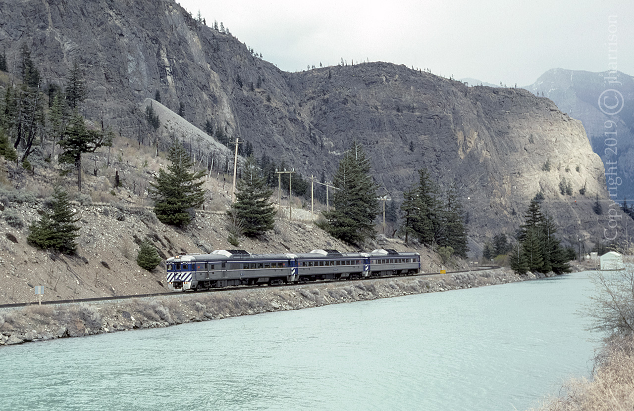 BC Rail RDC Budds 30 15 and 14 have just departed Lillooet and are southbound, traveling toward left of frame, and North Vancouver. The passenger service operated between North Vancouver and Prince George until October of 2002.