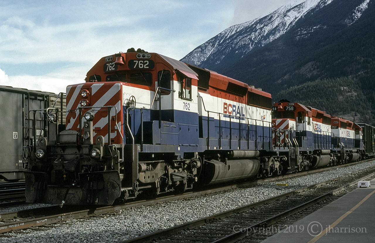 BCR 762, 758 and 757, three SD40-2's, are stopped in front of the Lillooet Station before they proceed north to Prince George. The trains ran very slowly through this region, and always with a track patrol, either a pickup or a speeder, watching for rock slides as they led them through the most treacherous parts of the terrain. I believe, from what I've read, that since CN's takeover in 2003, the track patrols were gradually replaced with barriers and slide fences. It was also in that year that what was once a world class railway experience, disappeared forever.