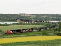 Train 359 Winnipeg to Prince George operating on the PNL crosses the North Saskatchewan River west of North Battleford