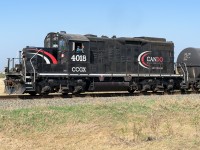 A friendly wave as the crew goes by on the way to the storage tracks just south of Edmonton.