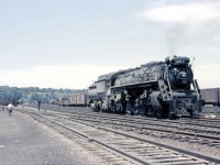 By June 1959, steam power was only to be used on an "emergency basis" on CN's Central Region. So catching Northern 6205 backing through Hamilton Yard was an unexpected treat...perhaps she had to make a stop at the shops or coaling dock (seen in the background). Also note the diesel-powered train in the South Yard.