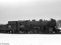 Canadian National S1a-class "Mikado" 3200 sits in the scrap line at Barrie in 1964, awaiting the cutting torch with other retired steam engines. CN 3200 was originally build by CLC in Kingston as Canadian Government Railway 2800 in 1916. It later became Canadian National 3200 in 1919.