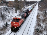 CN 3228 leads today's 183 down the CN York subdivision on an unusually snowy November afternoon. This capture was taken from the Hilda Avenue overpass of the CN York subdivision. Time was about 12:05 PM.