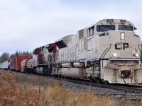 235-28 makes their way through Woodstock with CP 7021, CP 8637, and 111 cars. 7021 wears the Army Arid Regions scheme