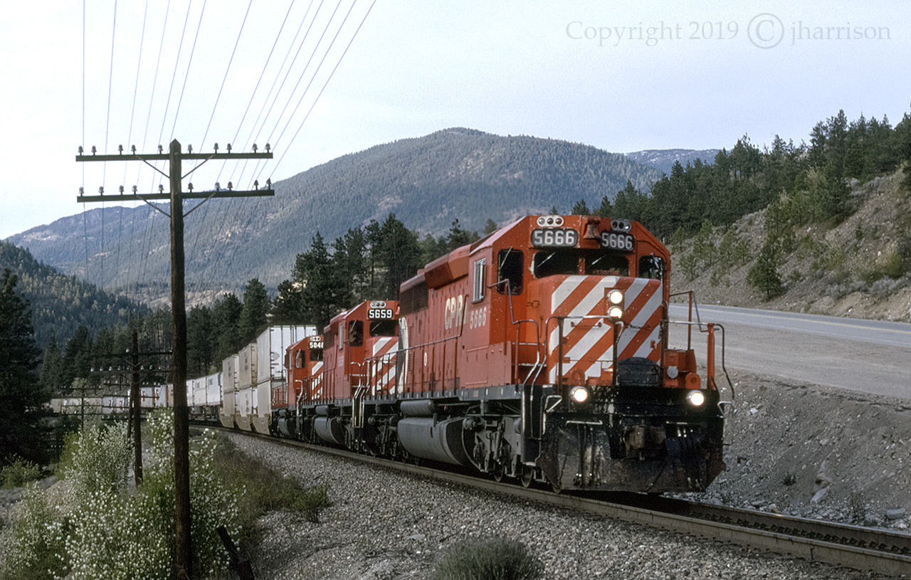 A westbound CP intermodal on the outskirts of Lytton B.C., where the Thompson and Fraser rivers converge, and a railway town well known for its summer heat waves, and therefore often ... the hottest spot in Canada.


CP 5666 was retired in 2007 and sold for parts in 2009. The 5659 was sold in 1999, and the 5848 in 2004.

 
Info courtesy: mountainrailway.com