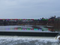The Canadian Pacific Holiday Train crosses the Grand River at Galt on a brisk November evening.  I enjoyed seeing all of the people standing on the bridge and along the riverbank to take in the scene of the train crossing the impressive bridge, it shows the power of the holiday season.