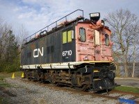 Boxcab CN 6710 had been displayed beside the Deux-Montagnes station until it was moved to a new location along the Rivière Mille Îles (seen here) just yesterday. According to the town of Deux-Montagnes (who I believe owns the locomotive), it will be restored by next summer; welcome news given how badly this veteran has deteriorated. CN 6710 was built by General Electric and delivered to the Canadian Northern as CNoR 600 in 1919. It was used on the electrified  Deux-Montagnes line until being retired in 1995.