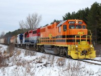 GEXR 581 heads east out of Clinton, approaching Front Road, with a colourful consist of RLHH 2117 in G&W paint, RLK 4095 in Rail America colours and RLK 4001 in RaiLink colours.  