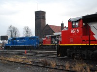 At the end of the conductors strike CN somehow ended up with two sets of power for 580/581 in Brantford.  The "old" set with CN 9615, CN 2110, and CN 8955 spent most of the strike parked in Paris.  The "new" set arrived overnight, consisting of GMTX 2277, CN 5273 and CN 9416.  The 580 crew coming on duty this morning initially appeared confused as to what units to use, checking their paperwork with the unit numbers.  They apparently rightfully chose the consist with the GMTX, and at the end of their shift already swapped the units around placing the GMTX in the middle.  Hopefully this consist sticks around awhile so I can get a decent shot of CN 5273 leading.  For the record this photo was taken from Usher Street over the fence and before I reported to work.  Not the greatest conditions for photography but it was a surprise to see so many locomotives in the yard and worthy of a shot. 