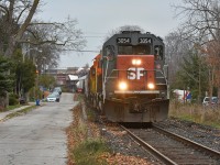 As the one year mark for the CN takeover of the GEXR Guelph Sub approaches, here's the last hurrah of GEXR 431 traversing Kent Street with the recently applied SP decal. Alot has changed through the operations of CN/Metrolinx including an unsightly install of a fence lining Kent Street. 

As a side note - GEXR 3054 continues to provide HP for B&P with the SP decal slowly fading. 