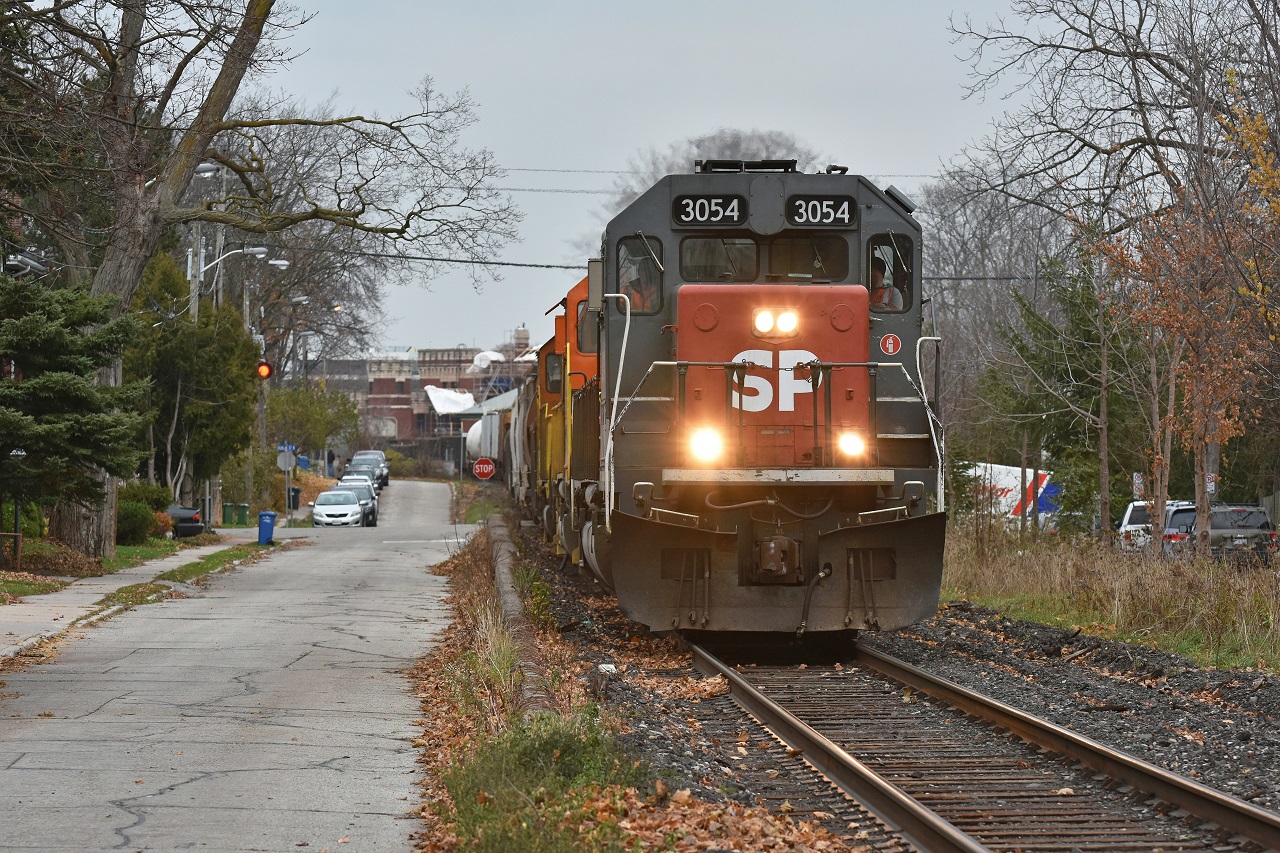 As the one year mark for the CN takeover of the GEXR Guelph Sub approaches, here's the last hurrah of GEXR 431 traversing Kent Street with the recently applied SP decal. Alot has changed through the operations of CN/Metrolinx including an unsightly install of a fence lining Kent Street. 

As a side note - GEXR 3054 continues to provide HP for B&P with the SP decal slowly fading.