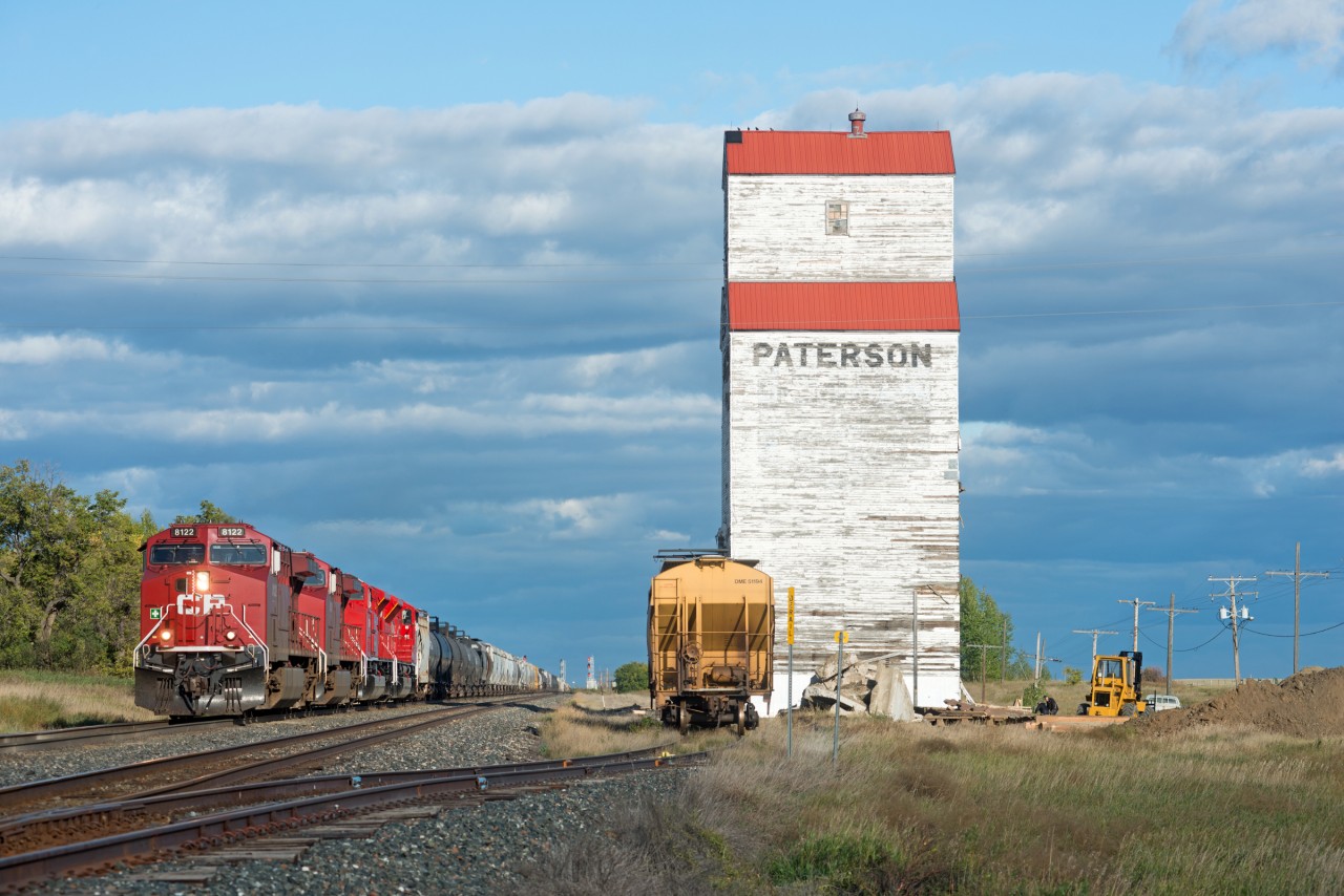 CP 499 has fresh SD70ACUs 7004 and 7005 in tow as it passes the elevator at Mortlach. This will be the only time the two rebuilds pass this elevator as it will not stand to see sunset the next day. The B/O car in the elevator track makes the scene look even more complete. When I shot Mortlach in 2007 there were two elevators at this location. http://www.railpictures.ca/?attachment_id=10844