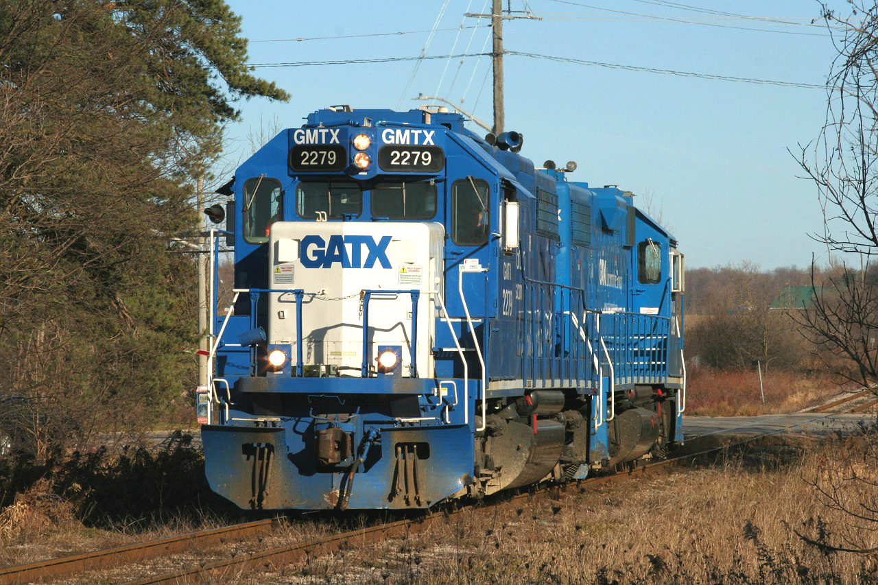 GMTX’s 2279 and 2323 roll CN train L568 with just light power through Baden, Ontario approaching Mill Street as they head towards Stratford on the Guelph Subdivision.