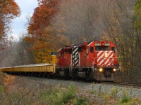 A pair of matching SD40s blast up the curve at Mile 58 headed to London. 