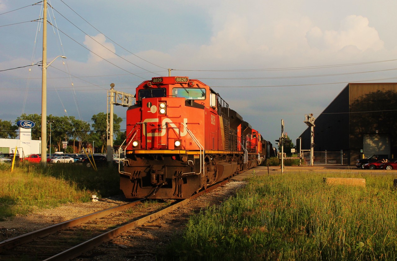 This was one of the many reroutes that traversed the rickety Chrysler Spur. A close look at the tracks and roadbed explains why the speed limit is only 10mph. The influx of CN traffic in the area during the derailment in Sarnia caused serious traffic issues in this part of the city. The road crossing pictured (Tecumseh Road) is one of the busiest and most vital arterial roads in Windsor. If VIA had to hold a train from entering the Chatham Sub, which was often the case, this and a few other busy roads were blocked for some time causing grid lock in the area. Motorists had to take long detours due to the track layout and lack of grade separated crossings. If it was a prolonged delay, the crews would break the train up at each crossing. As I recall this 364 was timed just right and was able to continue onto the Chatham Sub without stopping. Us railfans were definitely liking the uptick in rail traffic, but the general public in the city were at their wits' end by the time regular operations in Sarnia were resumed almost two weeks after the derailment.