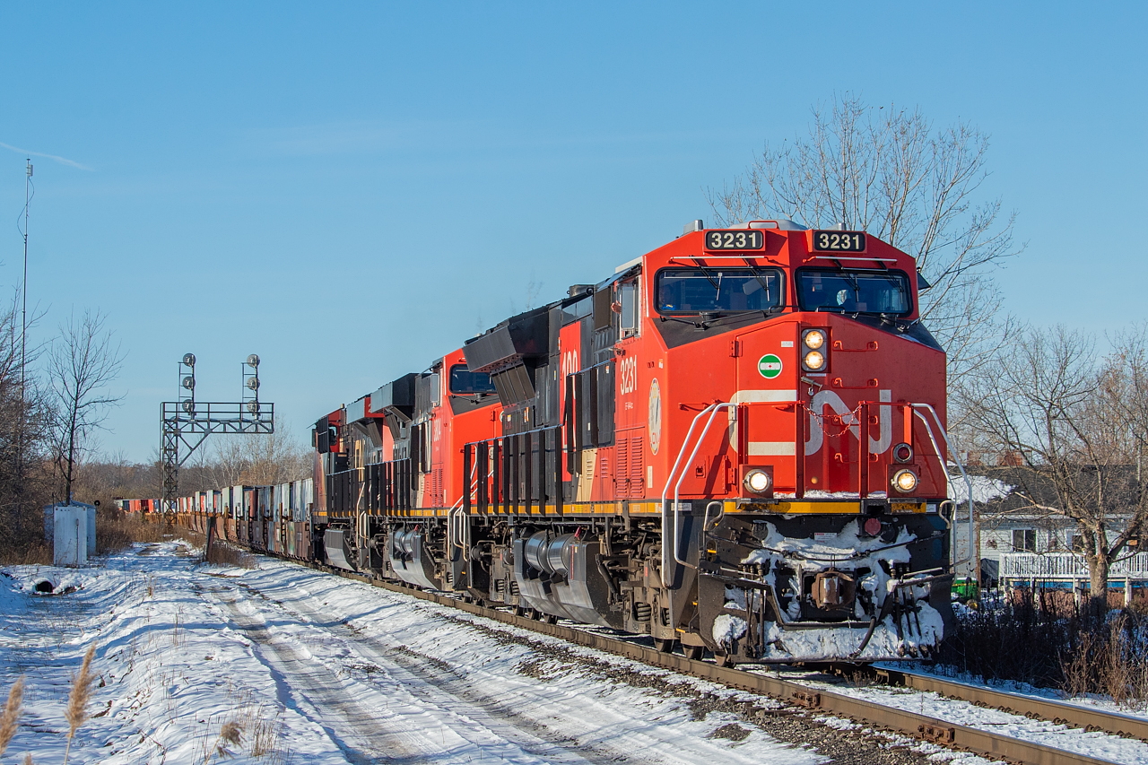 CN and CSX have new intermodal service, and Michael Berry shared a shot from Beaconsfield, QC. No one had shared a shot of the containers running on 422 or 421 yet here in Ontario, so figured I'd share this shot of 422 departing Port Robinson on Sunday. There was a pretty good string of containers on the head end, all single stacked for some reason. Many of the containers were Maersk, for those interested in that kind of thing. This power came of the previous day's 421, on which 3231 was the mid-train DPU.