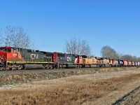 Westbound Grain hoppers with CN 2619, CN 5695 UP 7855, UP 6031 and bringinh up the rear ex GO-TRANSIT GP40-2L(W) CN 9675