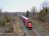 The country side of Puslinch provides the backdrop for the annual CP Holiday Train led by CP 2246 as it makes its way up the grade approaching the Highway 6 overpass. This is an excellent photographic spot but you sure take a chance with the traffic biting at your butt.