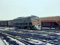CN FP9 6536 idles in Hamilton Yard on a February day in 1960.