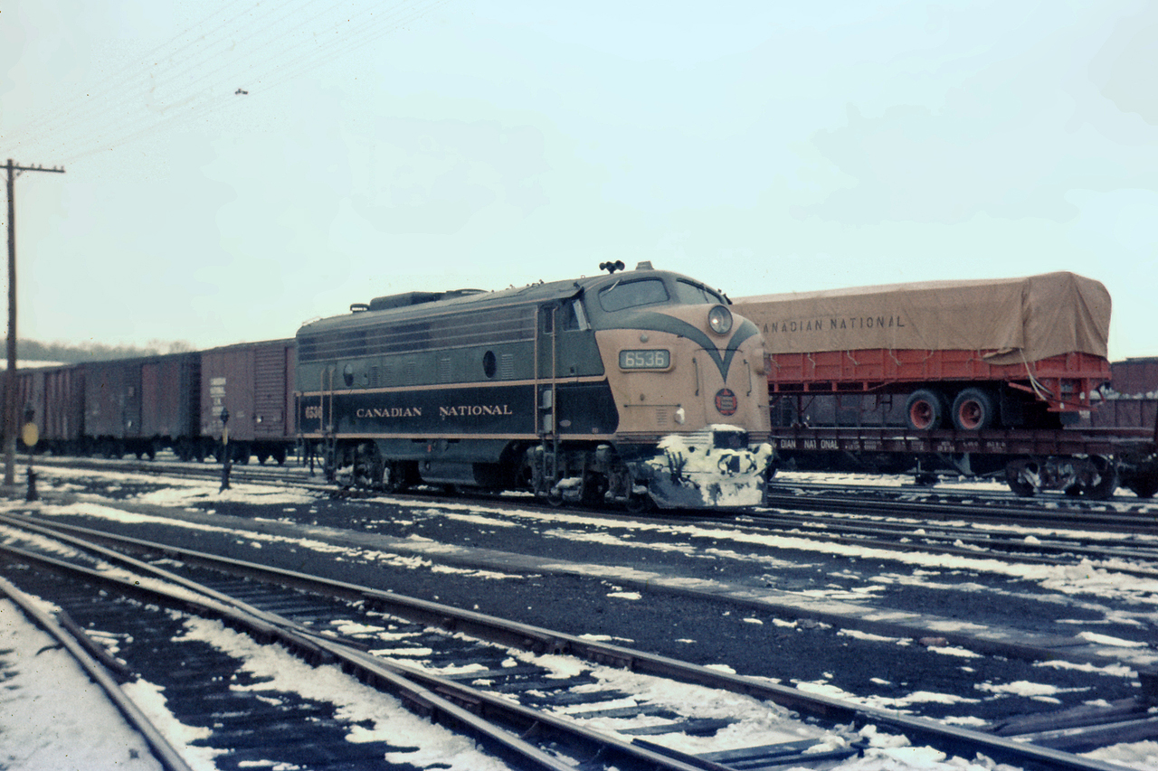 CN FP9 6536 idles in Hamilton Yard on a February day in 1960.