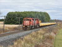 Managing track speed, pacman SD40-2s 6069 and 6055 waste no time heading West for London and eventually on to Windsor