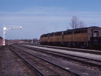 A trio of leased Union Pacific cab units (FA1 1641, FB1s 1614 and 1618) lead an eastbound through Guelph Junction in the spring of 1964.