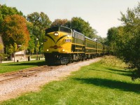 More than twenty years ago during a much simpler time and prior to the creation of the light rail network, Waterloo-St. Jacobs Railway (WSJR) 6508 leads a northbound excursion through Waterloo Park on the CN Waterloo Spur. 

The WSJR was a heritage/tourist railway that operated between Waterloo and St. Jacobs, Ontario from 1997 to 1999 on the CN Waterloo Spur utilizing FP9u's 6508 and 6520. The railway had ceased operations during 2000 citing rising maintenance expenses that deemed the operation no longer profitable. 