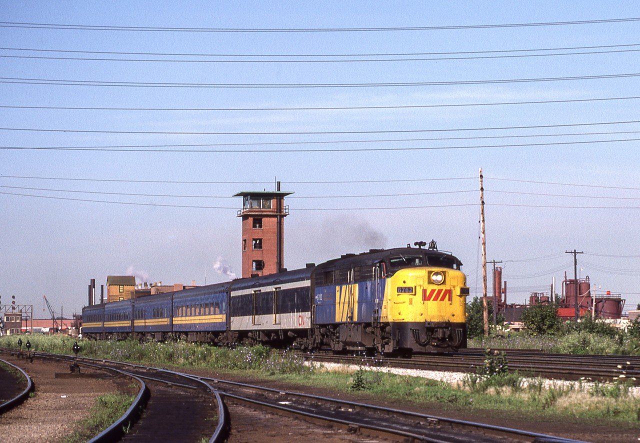 Peter Jobe photographed VIA 6762 with train VIA #82 at Mimico Yard in Toronto on July 24, 1980.