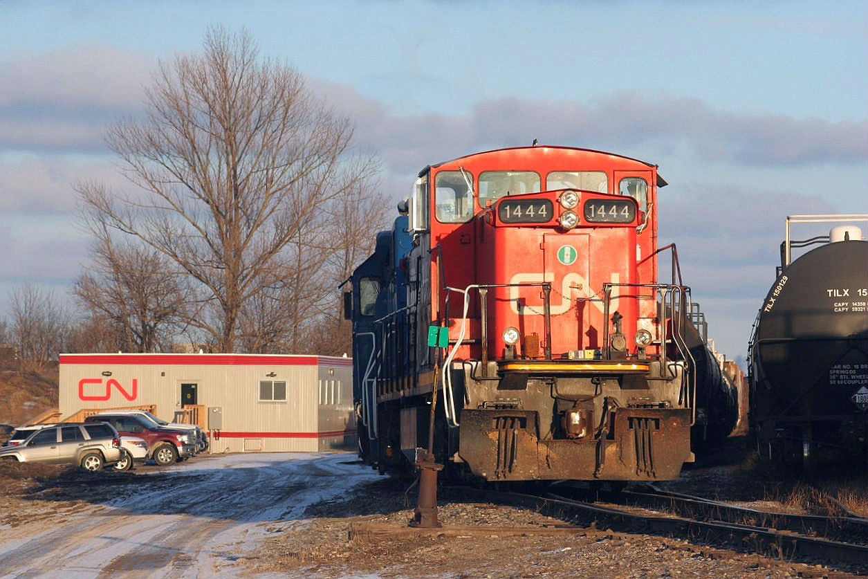 CN GMD1u 1444 has just returned from Guelph with a GMTX GP38-2 on L540 and is viewed near the CN Operations Centre in the Kitchener yard.