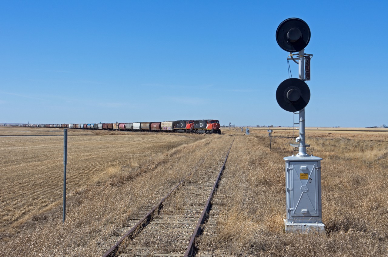 CN# 540 is about to cross the long out of service portion of the CP Kerrobert Sub just outside Rosetown Saskatchewan.
