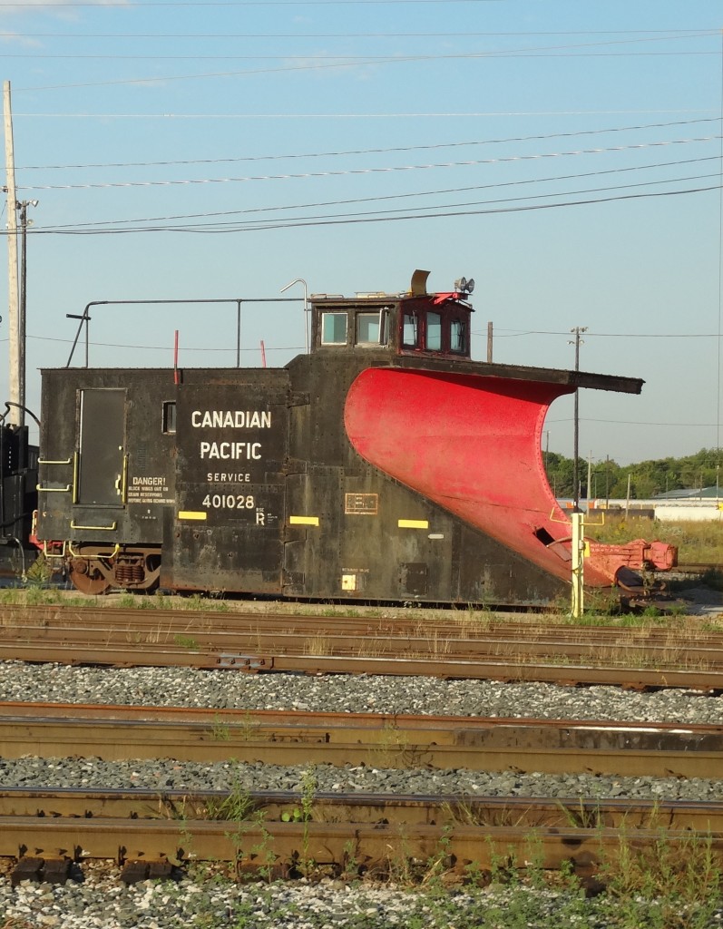 On September 20, 2016 while at Agincourt Yard assisting CP Work Equipment in preparing Ohio crane CP 414222 for shipment from Toronto to Winnipeg I captured plow CP 401028. At the time, the plow was coupled to Jordan spreader CP 402894 and parked on a stub track near the locomotive service facility. A year earlier on October 20, 2015 I was at CP Weston shops in Winnipeg where they had several plows inside being evaluated for potential repairs. I'm not sure if a plow refurb program was ever undertaken. I do know that several Jordan spreaders were refurbished and upgraded to have hydraulic controls instead of air cylinders.