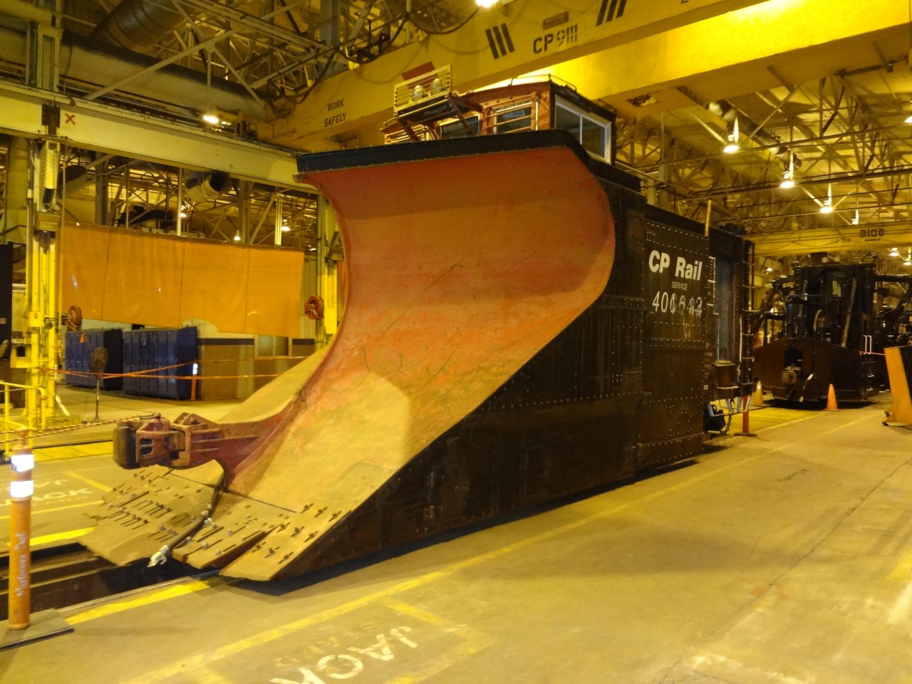 October 20, 2015 finds snow plow CP 401034 inside Weston shops in Winnipeg, MB waiting assessment to determine its future at CP. On the same track behind the plow was Jordan spreader CP 402877 which had just been upgraded to hydraulic controls from the original air controlled plow and wings. On the same track in from of the plow over an inspection pit was CP 414225, an American 825 DE locomotive crane receiving a detailed inspection and servicing. A great day at the shop if you're interests lean towards Work Equipment. :-)
