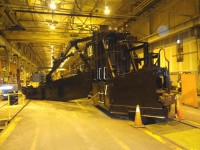 CP 402877 is a Jordan Type A, broken wing, mid-height plow spreader, serial number 864, built in 1953. It is pictured here inside CP's Weston Shops in Winnipeg, MB on October 20, 2015. This unit has just undergone conversion and upgrading from an air powered spreader to full hydraulic controls and operation and is waiting to be stenciled, tested, and loaded onto a Work Equipment ramp car for transport to Banff, AB where it will be unloaded on November 19, 2015, then moved to Lake Louise, AB for its winter assignment.
