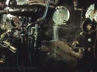 Inside the cab of the CPR 2860 Royal Hudson. My gear at the time didn't include a wider angled lens but I hope this photo gives at least some idea of the interior detail and interesting character of this old locomotive.

GPS is approximate.