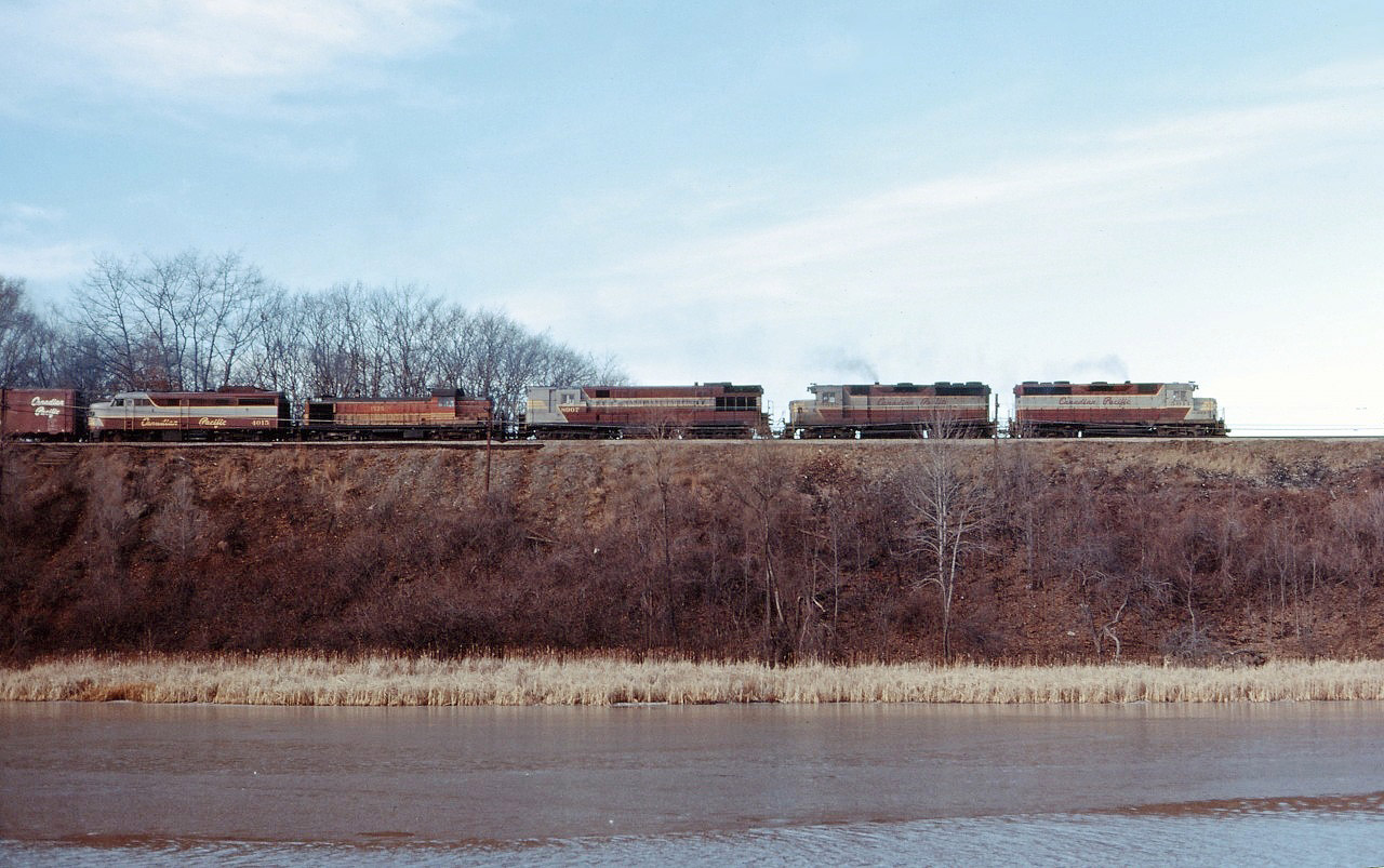 This has to be one of the most unusual consists that I have seen at Bayview over the years--CP GP35s 5011 and 5012, H-24-66/Trainmaster 8907, leased Boston & Maine RS3 1535, and FA1 4015 leading an extra east!