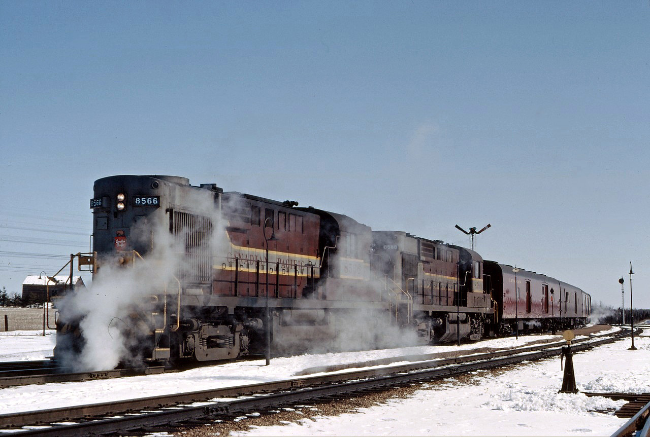 In its last months of operation, CP train No. 21 makes its station stop at Guelph Junction behind a pair of steam-generator equipped RS10s units. Come April 26 (1964), the conventional train will be replaced by RDCs west of Toronto (it continued as an overnight train between Montreal and Toronto for a couple more years). Westbound No. 21 departed Toronto at 8:30 AM and had a flag stop at Guelph Jct at 9:37; it's eastbound counterpart No. 22 was still a named train in the timetable, "the Overseas", departing Detroit at 4:25 PM, Guelph Jct at 9:05 PM and arriving Toronto at 10:20 PM.