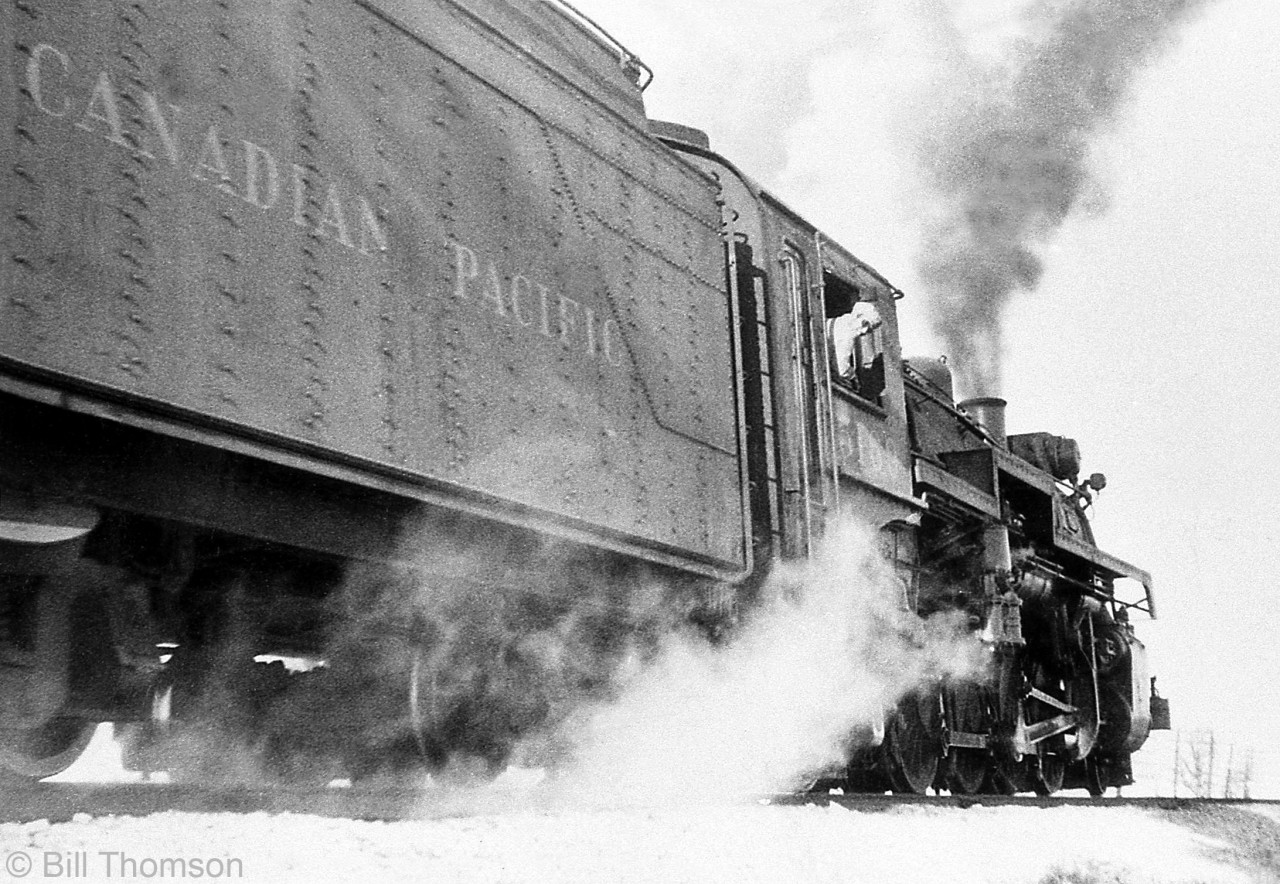 Snow and Steam: the engineer pokes his head out of CPR P1e Mikado 5189 (built by MLW in 1913), at Mavis Road in Cooksville, Ontario during 1958. 5169 was retired and scrapped later in 1958, spending its final years assigned to the Ontario district out of London.