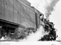 Snow and Steam: the engineer pokes his head out of CPR P1e Mikado 5169 (built by MLW in 1913), at Mavis Road in Cooksville, Ontario during 1958. 5169 was retired and scrapped later in 1958, spending its final years assigned to the Ontario district out of London.