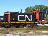 CN 7316 is seen here at Lambton Diesel partially cannibalized, looking like a parts engine. This is before the CN police station was built nearby, the workers there had no problem with me walking around with my camera as long as I stayed off the equipment. 