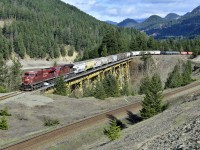 CP 8817 leads a westbound load of grain across the Stoyoma Creek trestle near Boston Bar. These tracks belong to CN but due to directional running they carry all westbound traffic in this area.