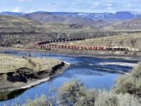 An eastbound CN Intermodal is seen winding it's way through Juniper Beach Provincial Park just east of Cache Creek.