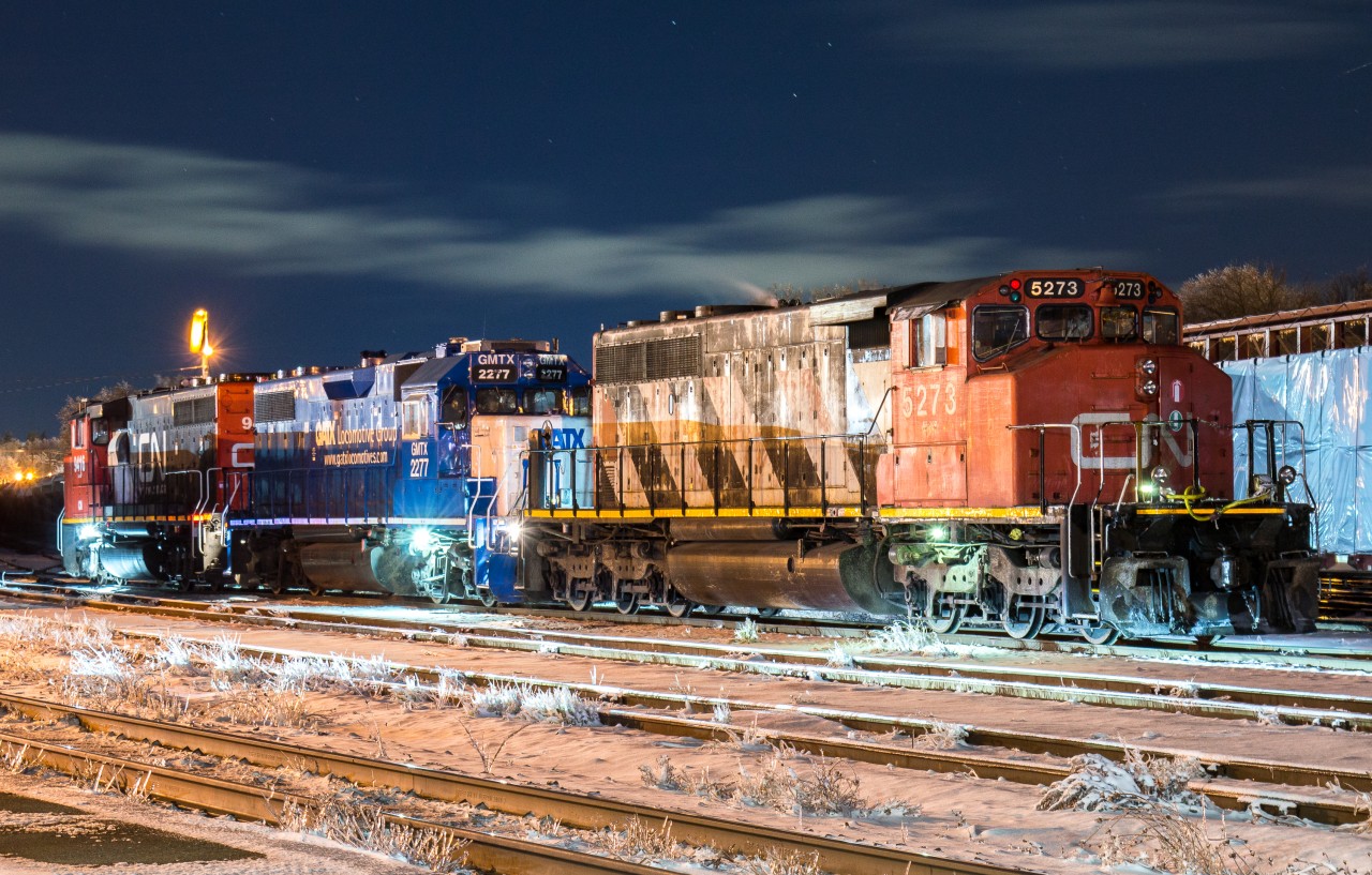 On a frigid December evening, CN L581 rests in Brantford Yard as CN 434 completes their work.  The power for 581 on this day was CN 5273, GMTX 2277, CN 9416.  In the last week we have had the CN 9416 depart due to a stuck horn and the CN 2304 was added today to lead the train Eastbound.  This just proves that in our hobby you have to take the opportunity to photograph something when it presents itself.