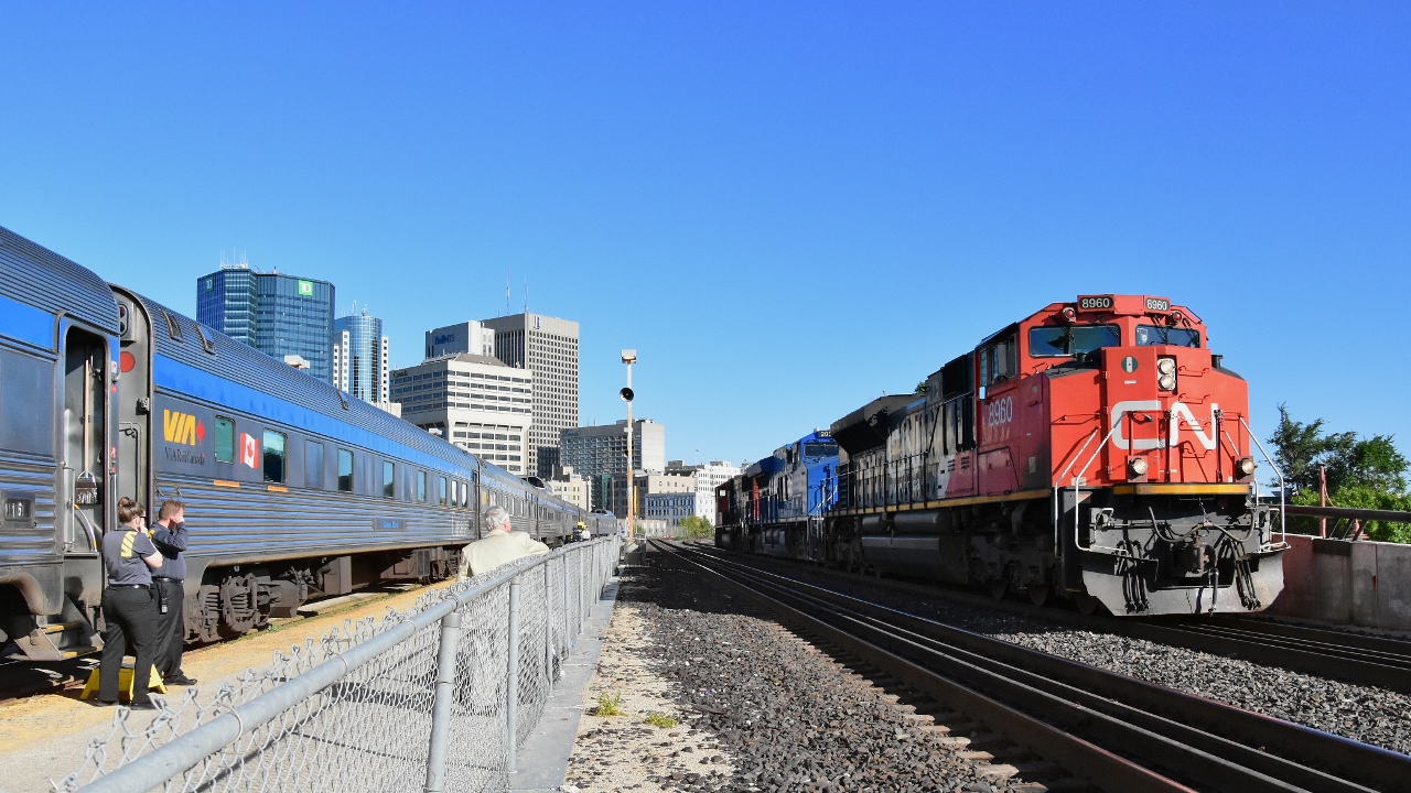 CN power passing Winnipeg Union Station with VIA #1 at platform, Track 4. 


 CN 8960 / IC2031 / CN89xx 


 September 10, 2018 at WUS, digital image by S.Danko


what's interesting


Winnipeg Union Station excluded the CPR. WUS was built as a joint venture between the Canadian Northern Railway (CNoR), National Transcontinental (NTR), Grand Trunk Pacific Railway (GTP) and the Dominion government. 


First train serviced WUS  in 1911. 


sdfourty