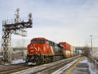 CN 3850 brings up the rear of CN 108. Up front is CN 3847.