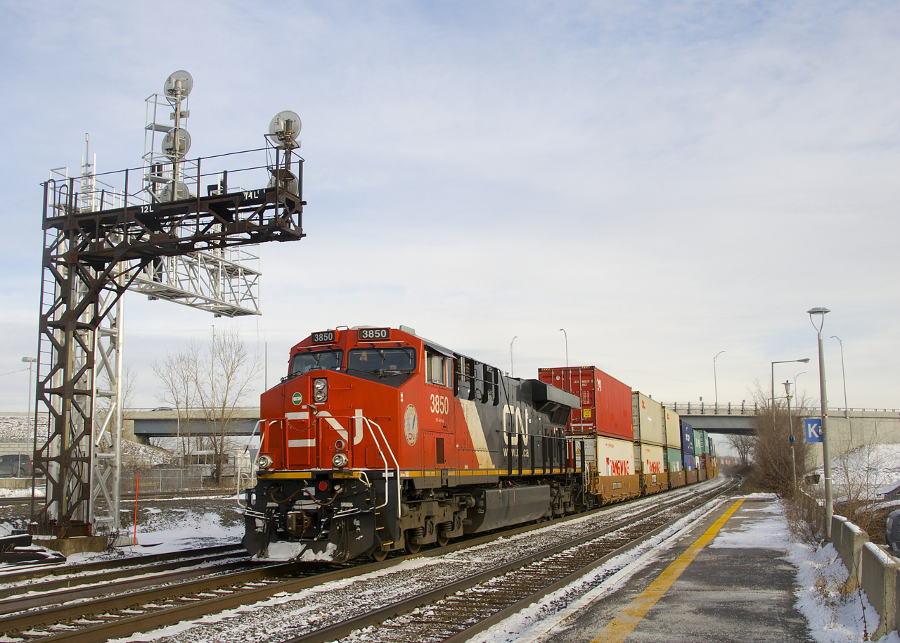 CN 3850 brings up the rear of CN 108. Up front is CN 3847.