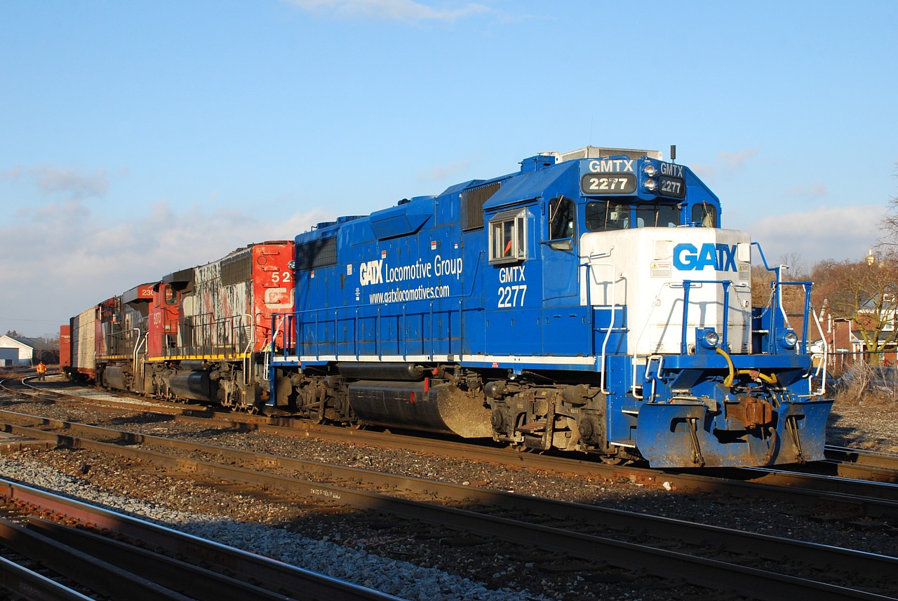 Another nice brief sunny morning before the clouds rolled in finds 580 switching with GMTX 2277, CN 5273 and CN 2304.  After years of watching single CN GP9RMs on 580 I'm loving the variety lately.  580 would soon leave with seven cars for Normerica.  They made quick work of that before returning to the yard, grabbing cars for CGC and then heading off to Hagersville.