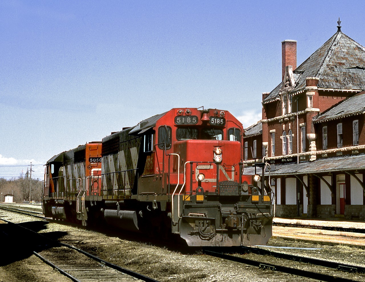 The yard engine sits on spot downtown in front of the station while the crew grabs a lunch. The Canadian Northern built station is a designated heritage building and has been renovated as an office building